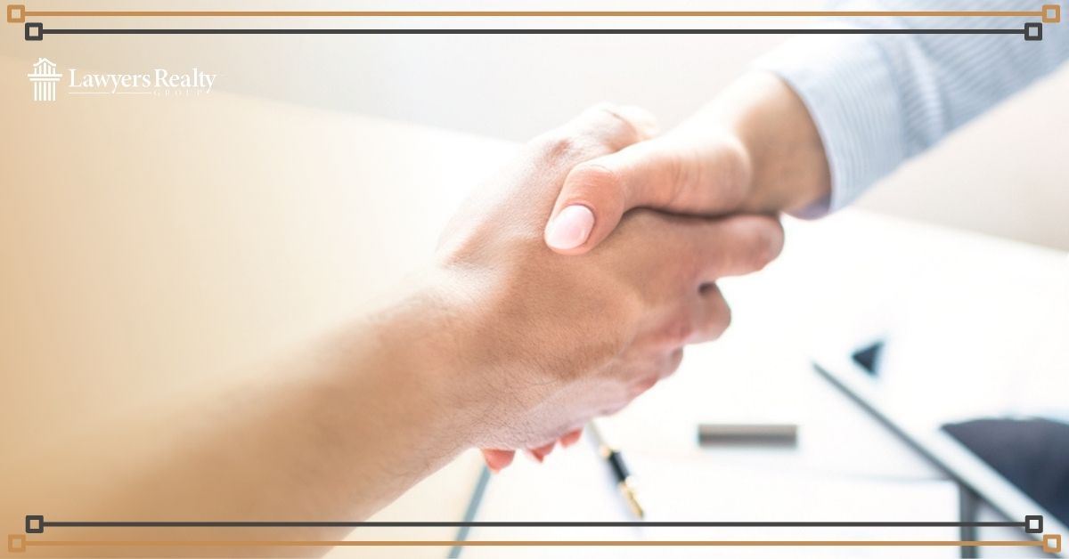 Two people shaking hands